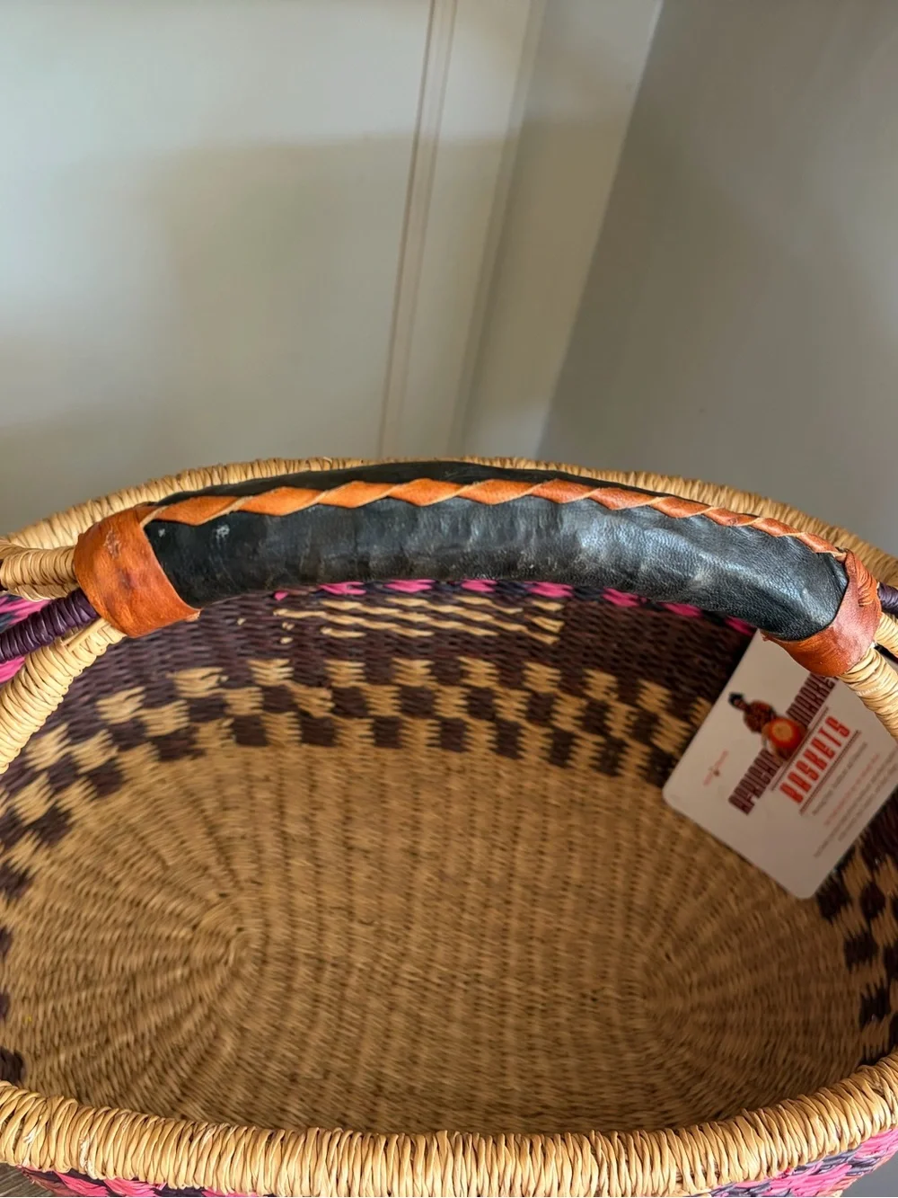 African Handwoven Ghanaian Straw Basket with Leather Handle pink red beige